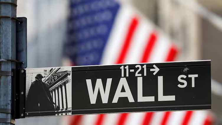 Wall Street closes lower on trade war escalation, weak data