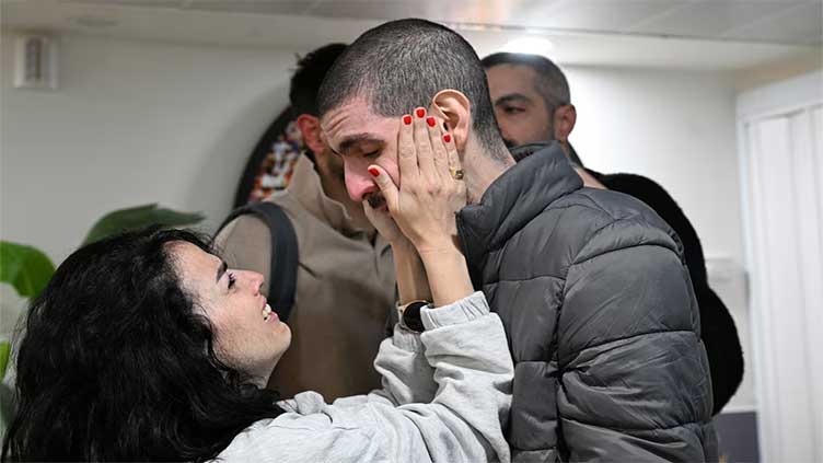 Hamas frees three hostages, Israel begins releasing Palestinians