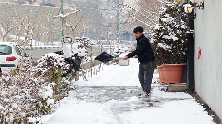 Iranian schools and offices shut as cold snap bites