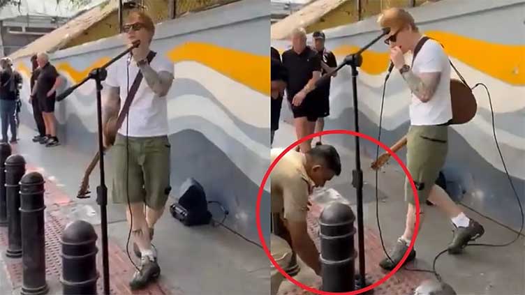 Police in India pull the plug on British singer Ed Sheeran's impromptu street concert