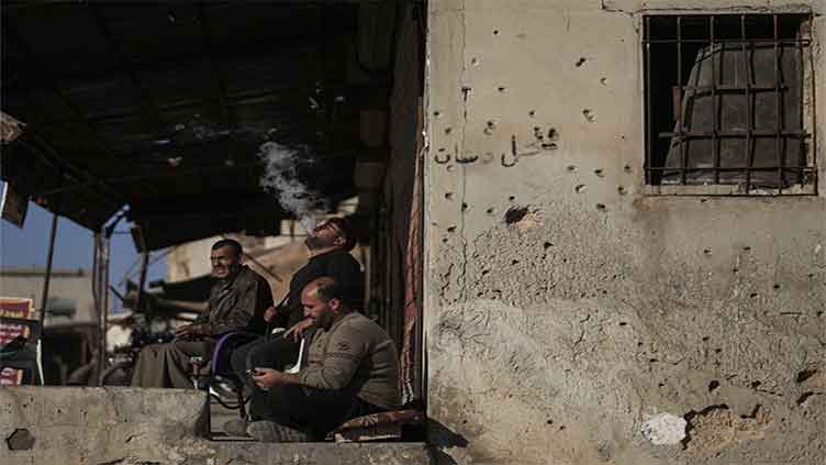 Syrians returning to the town of Tel Rifaat find homes in ruins and underground tunnels