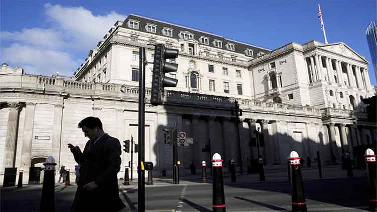 Bank of England halves UK growth projection and cuts main interest rate to 4.50pc