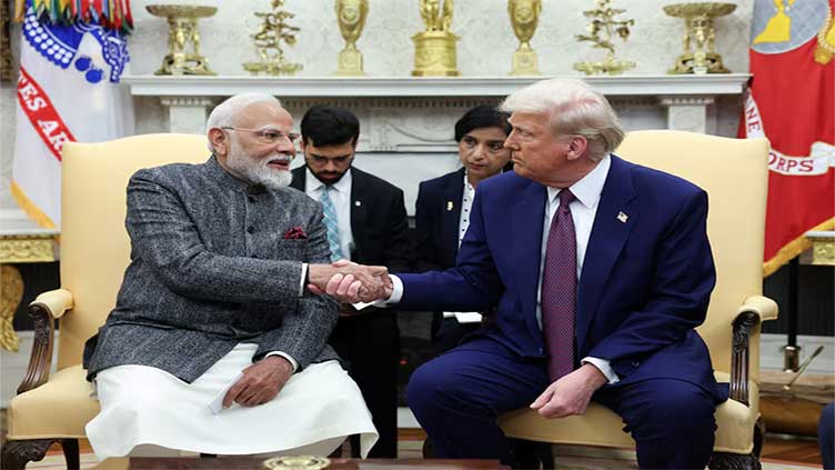 Denouncing India tariffs, Trump agrees to trade talks