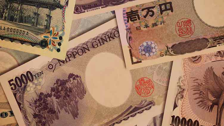 Yen gains; Aussie, kiwi steady before rate decisions