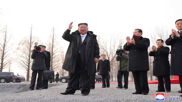 North Korea's Kim makes rare visit to father's tomb, says devoted to 'sacred struggle'