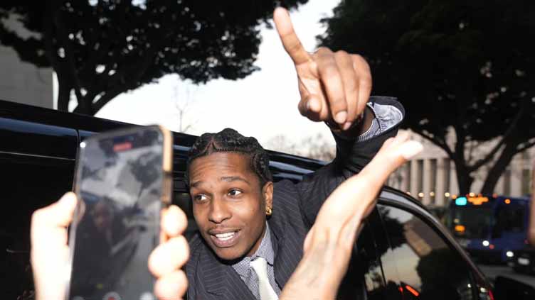 A$AP Rocky dives into Rihanna's arms as not guilty verdict is read at felony assault trial