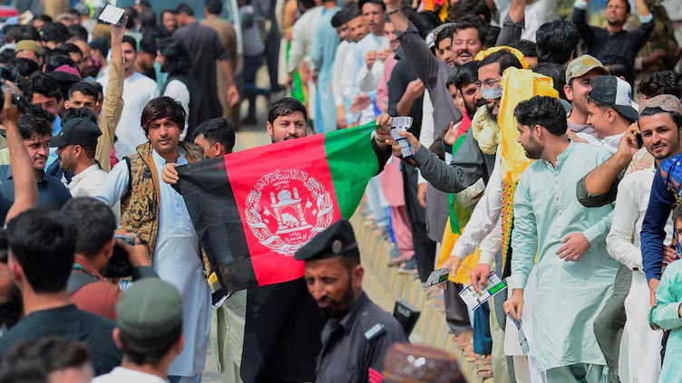 Afghan refugees cheer Champions Trophy debut in Pakistan, but deportation fears weigh