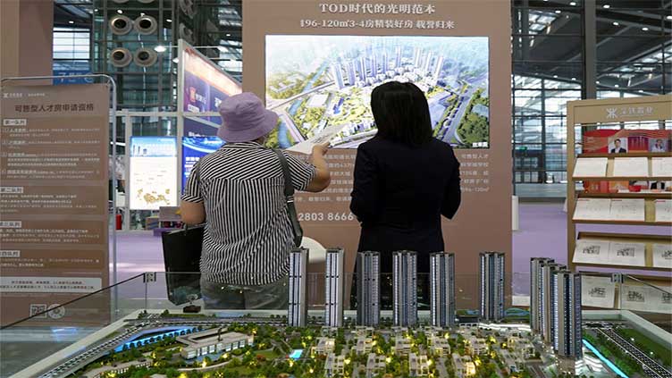 China's home prices to drop further, recovery not expected until 2026: Reuters poll