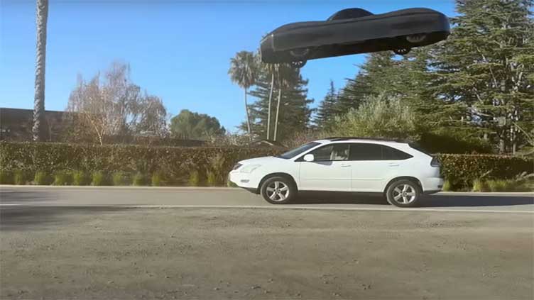 World's first flying car hops over vehicle in public test