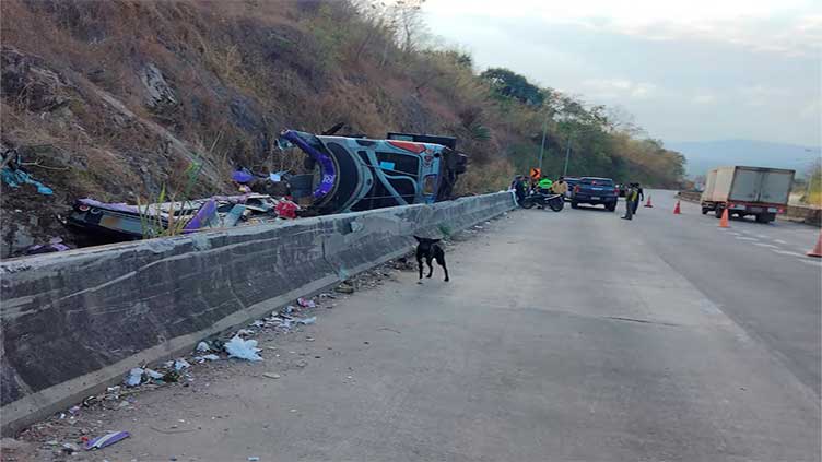 Thailand bus overturns in ditch killing at least 18 passengers