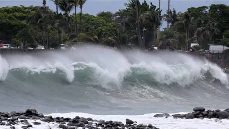 Cyclone Garance hits French island of La Reunion, blowing away roofs