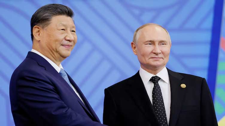 China and Russia should strengthen coordination in international affairs, Xi says