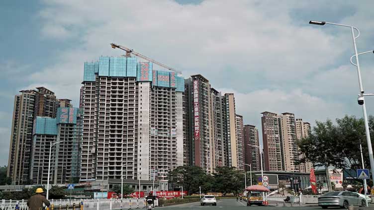 China December new home prices rise a touch faster, survey shows