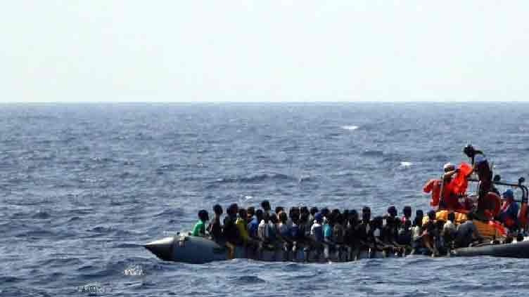 At least 20 migrants missing as boat sinks off Italy, seven rescued