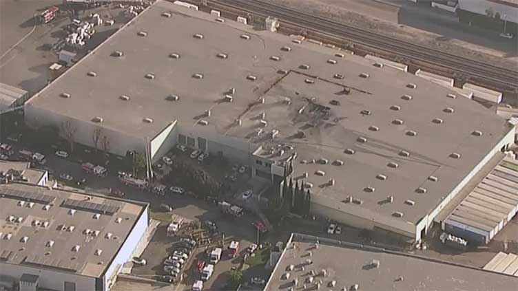 Two dead, 15 reported injured after plane crashes into warehouse in California