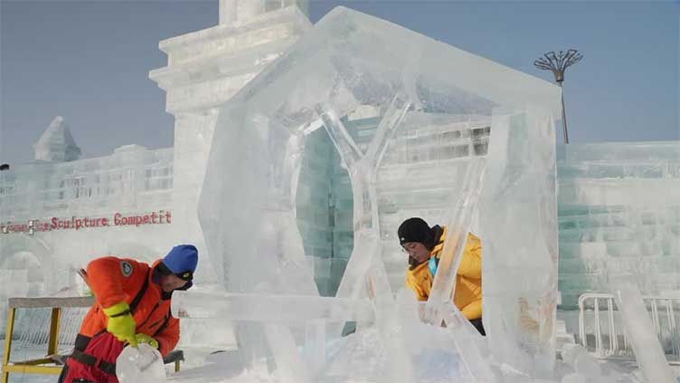 International sculptors get creative with 'aurora', 'shaman' designs at China ice festival