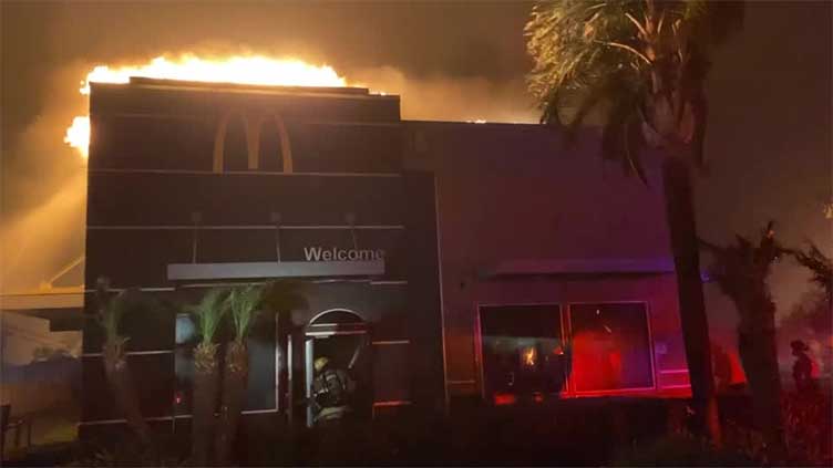 McDonald's restaurant in flames as Eaton Fire burns in California