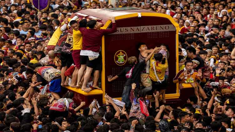 Philippines' Black Nazarene procession draws hundreds of thousands of devotees