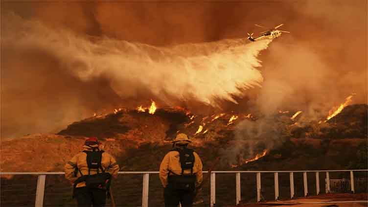 Los Angeles wildfires death toll rises as crews fight heavy winds to save homes and landmarks