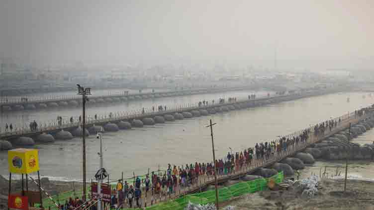 Indian Hindu pilgrims take the plunge ahead of largest gathering