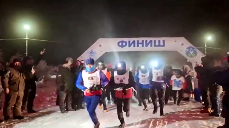 Dozens brave extreme -50C weather to run marathon in Yakutia