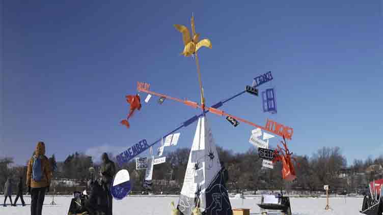 Thousands enjoy art on a frozen Minneapolis lake despite bone-chilling temperatures