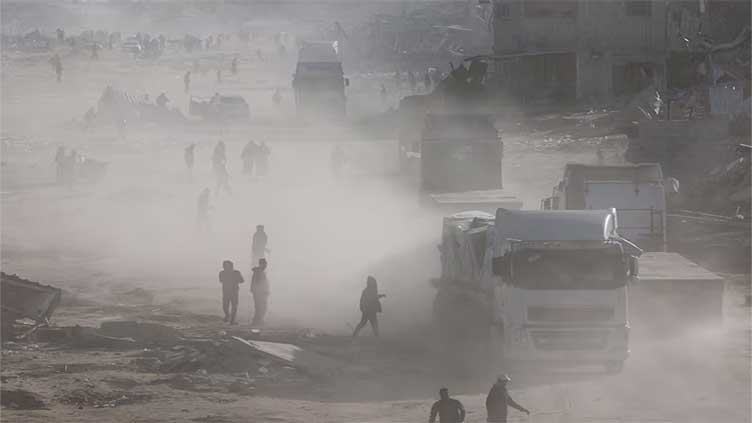 Gazans begin searching for people under rubble on day two of ceasefire