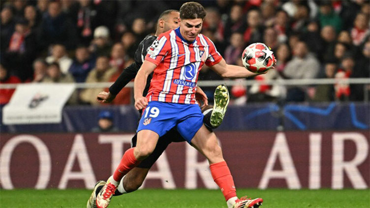 Alvarez sends Atletico past Leverkusen late as both sides see red