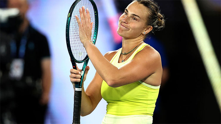 Sabalenka battles 'unbelievable' wind to keep Melbourne hat-trick alive