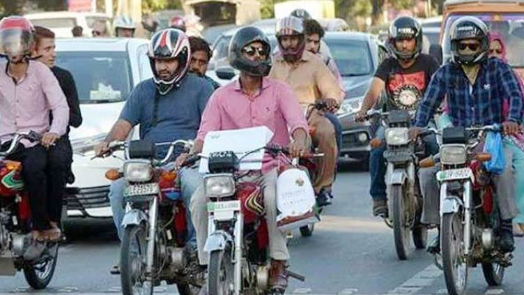 Lahore CTO makes helmets mandatory for riders, pillions