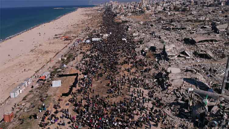 Palestinians celebrate their return to northern Gaza after 15 months of war