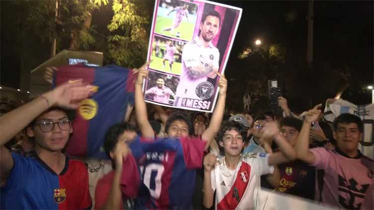 Hundreds of excited fans welcome Messi to Peru for friendly match