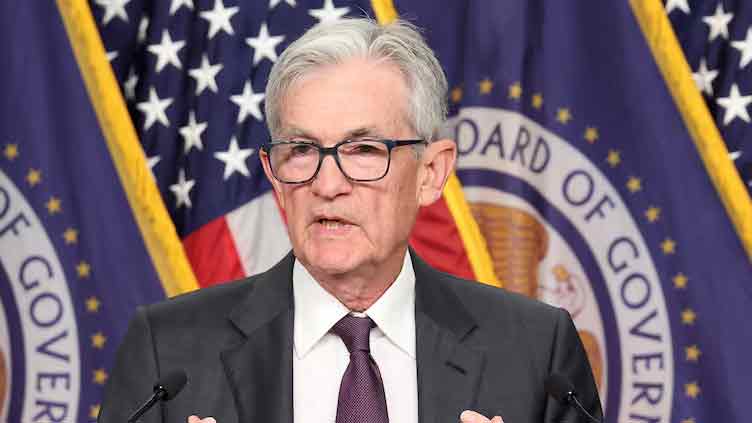 Fed leaves rates unchanged, sees no hurry to cut again