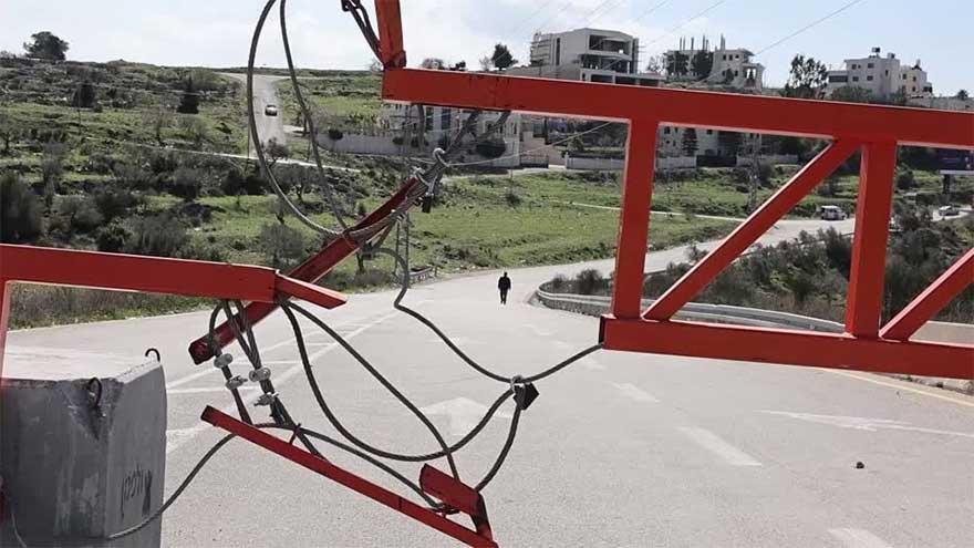 West Bank town becomes 'big prison' as Israel fences it in