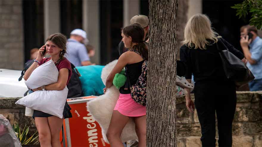 Search for Texas flood victims enters third day as more rain forecast