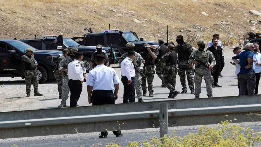 Kurdish PKK militants begin handing over weapons in cave in Iraq