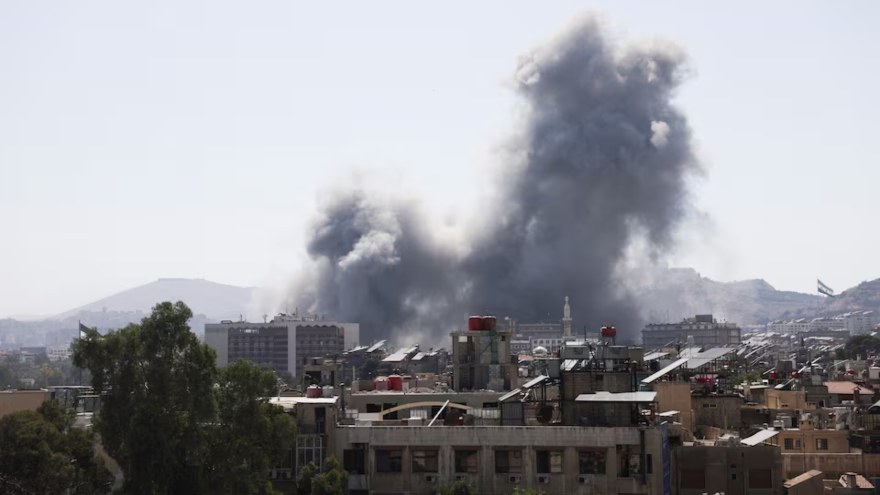 Israel strikes Damascus as fighting rages in southern Syria