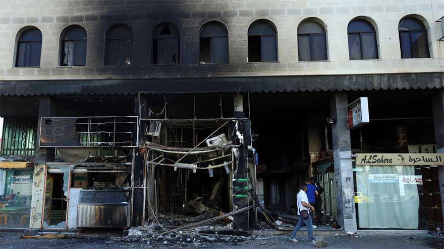 After days of bloodshed, residents of Syria's Sweida confront devastation
