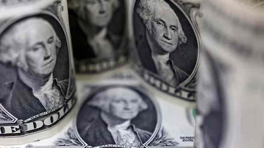 Dollar set for weekly gain as firm US data tempers Fed easing bets