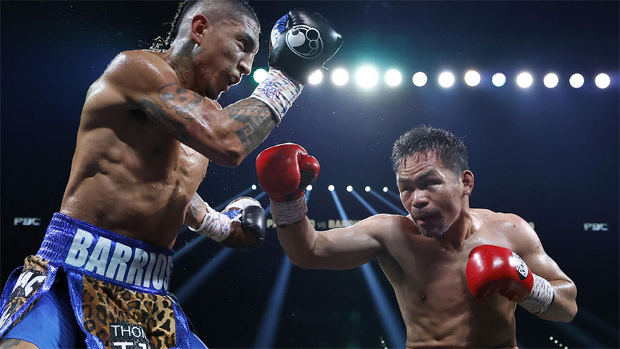 Pacquiao held to draw by Barrios in world title return