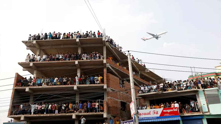At least 19 killed as Bangladesh air force plane crashes into college campus