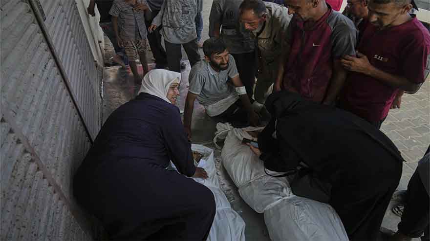 UN food agency says Israeli tanks and snipers opened fire on a crowd seeking aid in Gaza