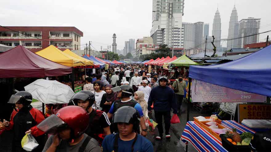 Malaysia PM announces cash aid, fuel price cut to address rising living costs