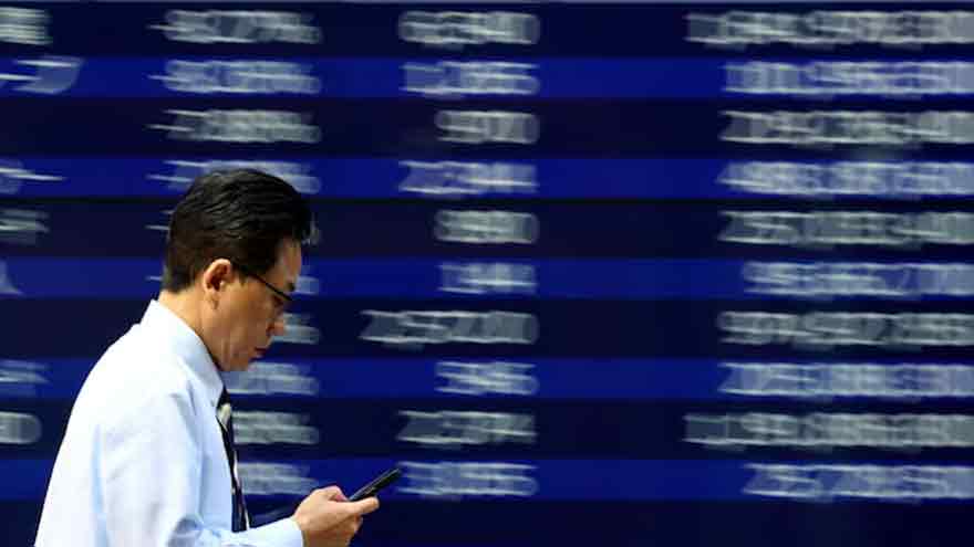 Asian stocks slip from highs as markets brace for crucial week