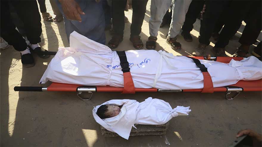 Israeli fire kills dozens in Gaza, officials say, as aid delivery remains chaotic after new measures