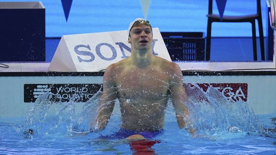 Léon Marchand breaks world record in 200 individual medley in 1 minute, 52.61 seconds