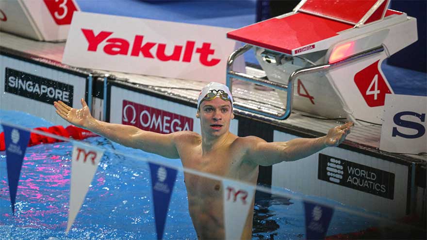 Marchand shatters record as US, Australia win more world gold