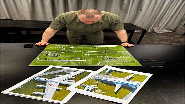 Ukraine destroyed more than 40 military aircraft in a drone attack deep inside Russia, official says