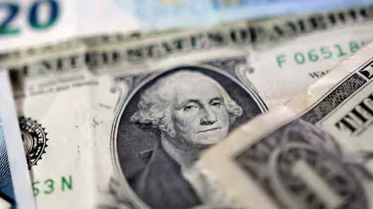 Dollar holds near six-week low as trade war wears on US economy