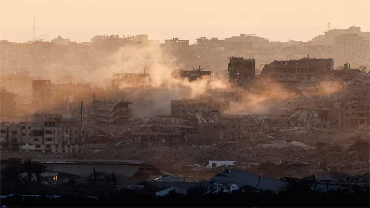 Three killed, dozens wounded in Israeli military's firing near aid site in Gaza, medics say